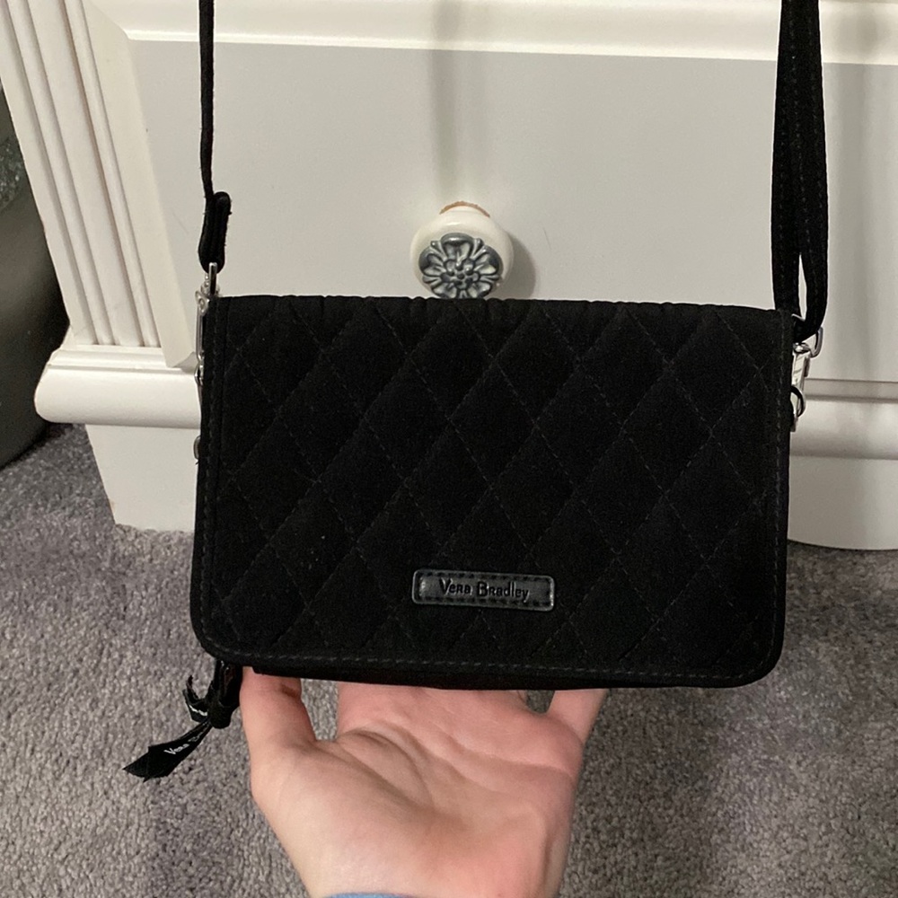 Black Vera Bradley Wristlet/Crossbody with rose design on the inside